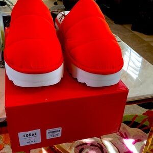Maeve slide on sold by Anthropology. Fits sizes 10/11. Beautiful coral with NWT